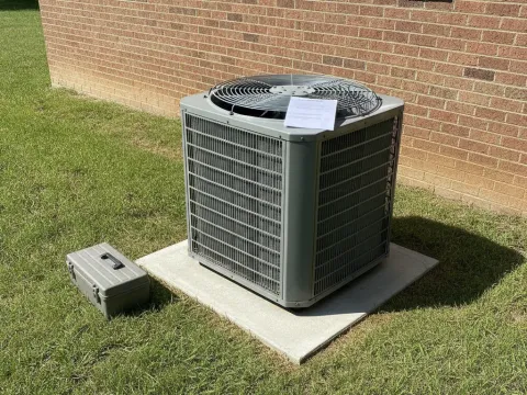 Freshly serviced outdoor AC unit clean and ready for Providence Village summer